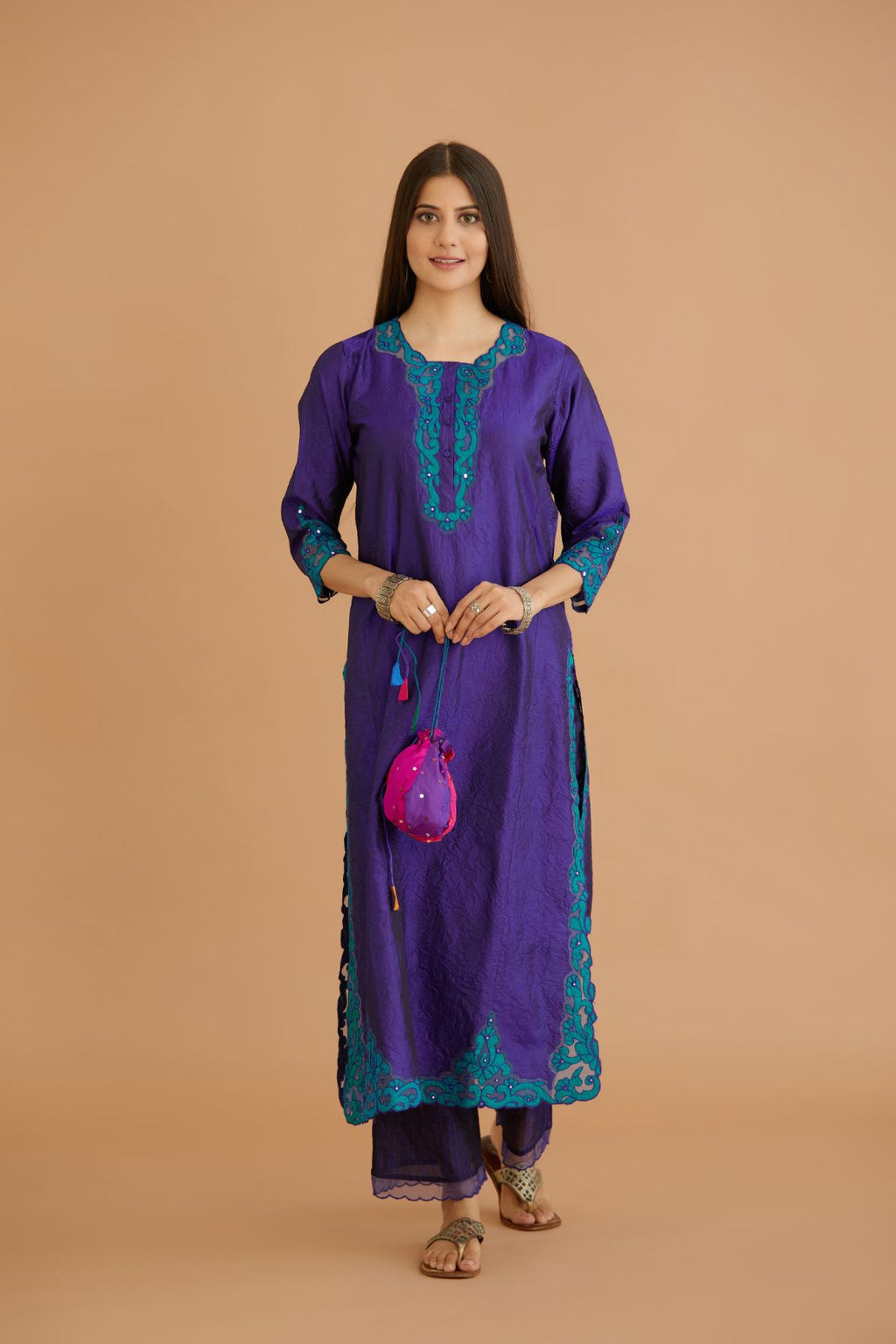 Blue hand crushed silk straight kurta set with silk and organza cutwork embroidery, highlighted with hand attached mirrors.