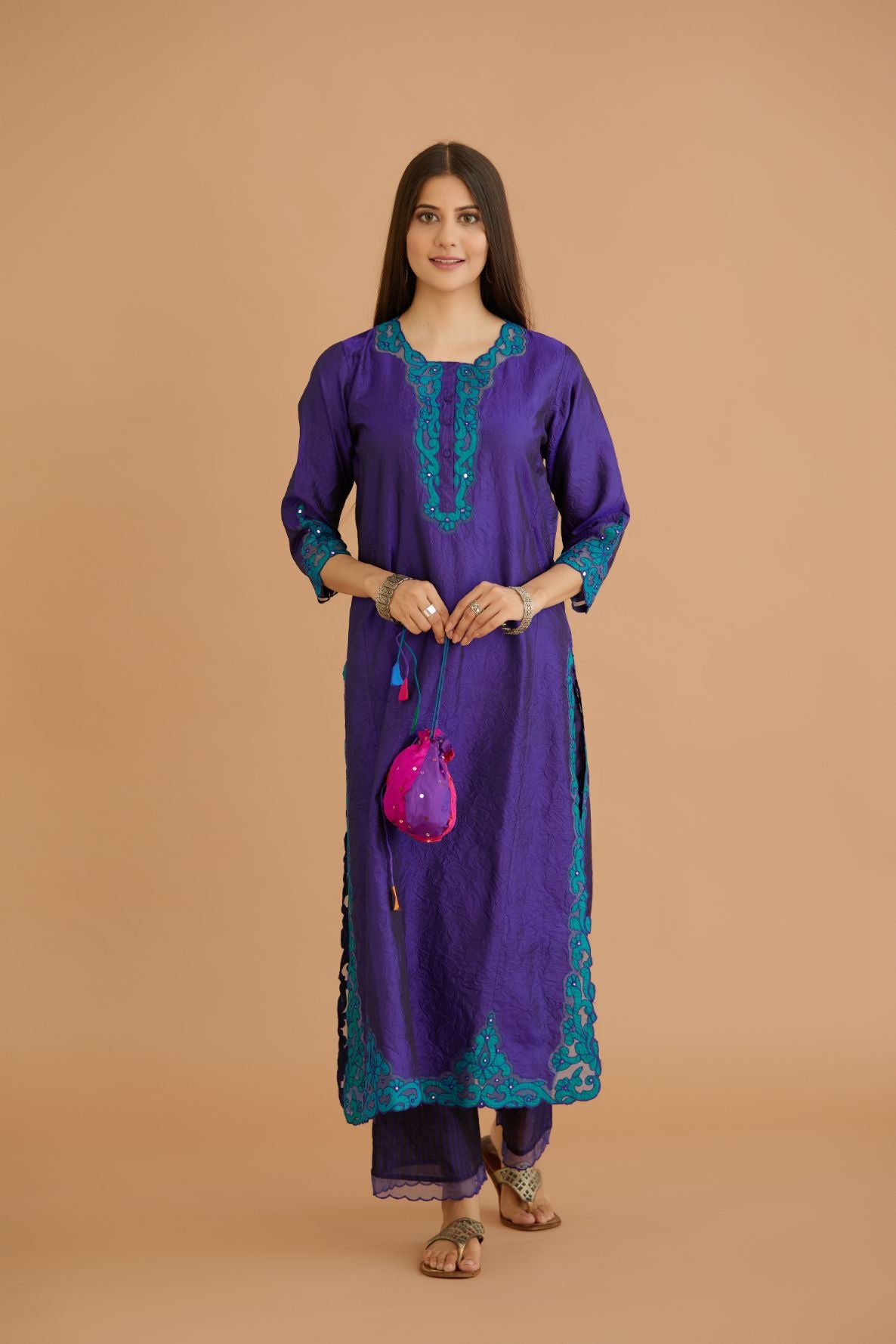 Blue hand crushed silk straight kurta set with silk and organza cutwork embroidery, highlighted with hand attached mirrors.