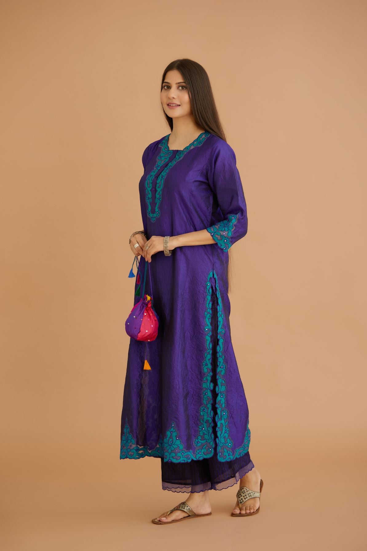 Blue hand crushed silk straight kurta set with silk and organza cutwork embroidery, highlighted with hand attached mirrors.