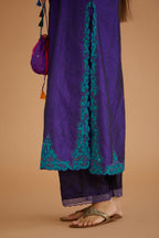 Blue hand crushed silk straight kurta set with silk and organza cutwork embroidery, highlighted with hand attached mirrors.