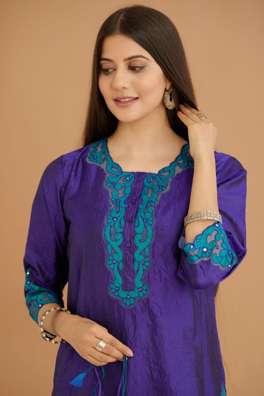 Blue hand crushed silk straight kurta set with silk and organza cutwork embroidery, highlighted with hand attached mirrors.