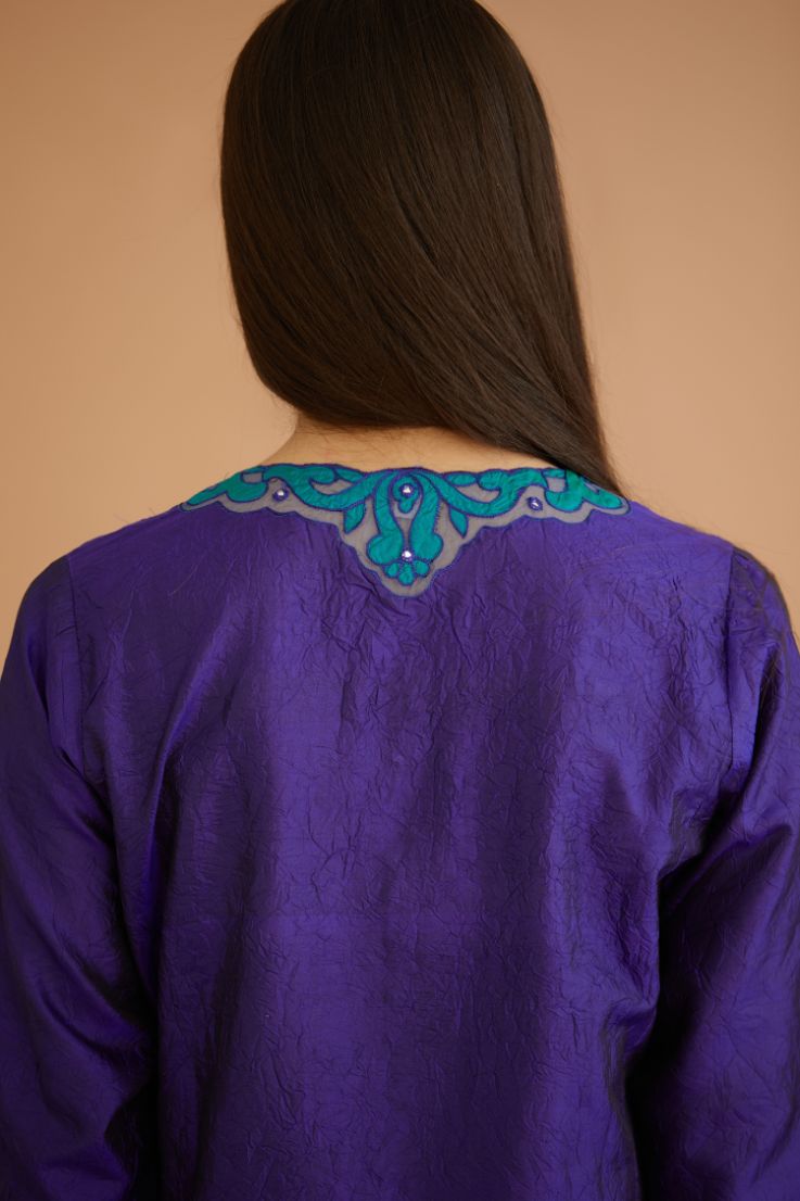 Blue hand crushed silk straight kurta set with silk and organza cutwork embroidery, highlighted with hand attached mirrors.