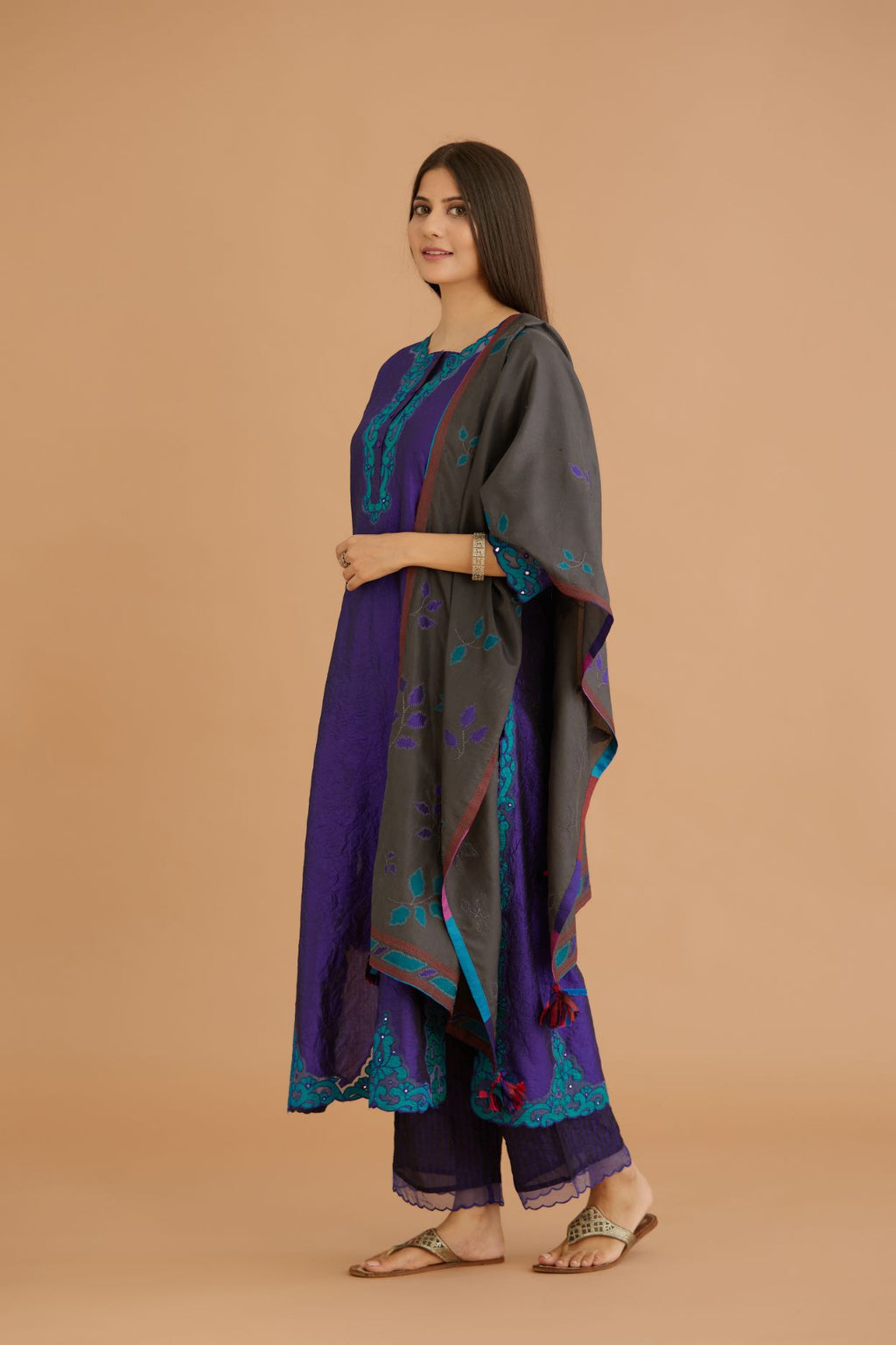 Blue hand crushed silk straight kurta set with silk and organza cutwork embroidery, highlighted with hand attached mirrors.