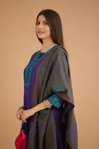 Blue hand crushed silk straight kurta set with silk and organza cutwork embroidery, highlighted with hand attached mirrors.