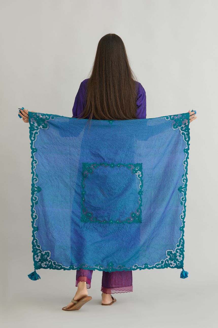 Teal blue hand crushed silk square scarf with silk and organza cutwork embroidery and hand attached mirrors.
