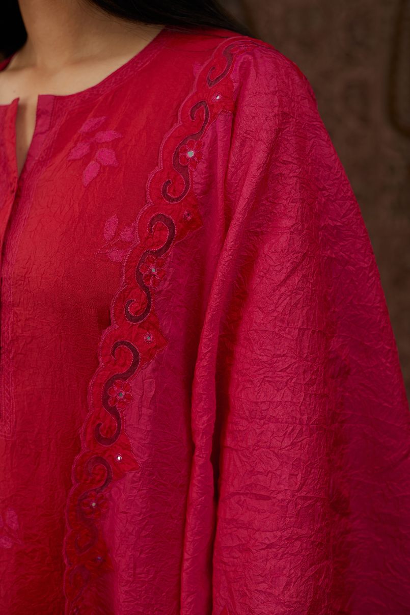 Fuchsia hand crushed silk stole with silk and organza cutwork embroidery and hand attached mirrors.