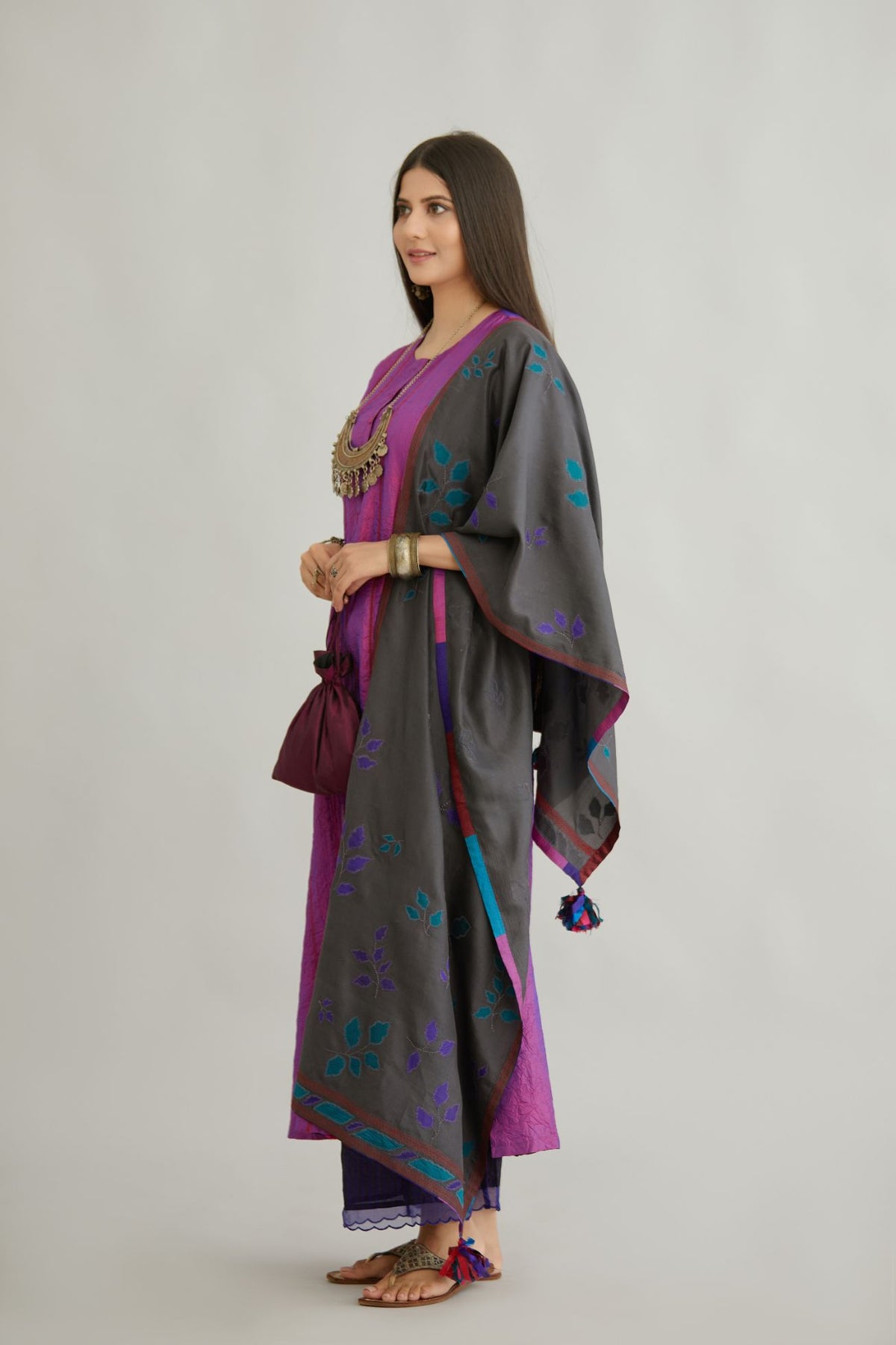 Grey hand crushed silk stole with silk fabric applique work and embroidery at edges.