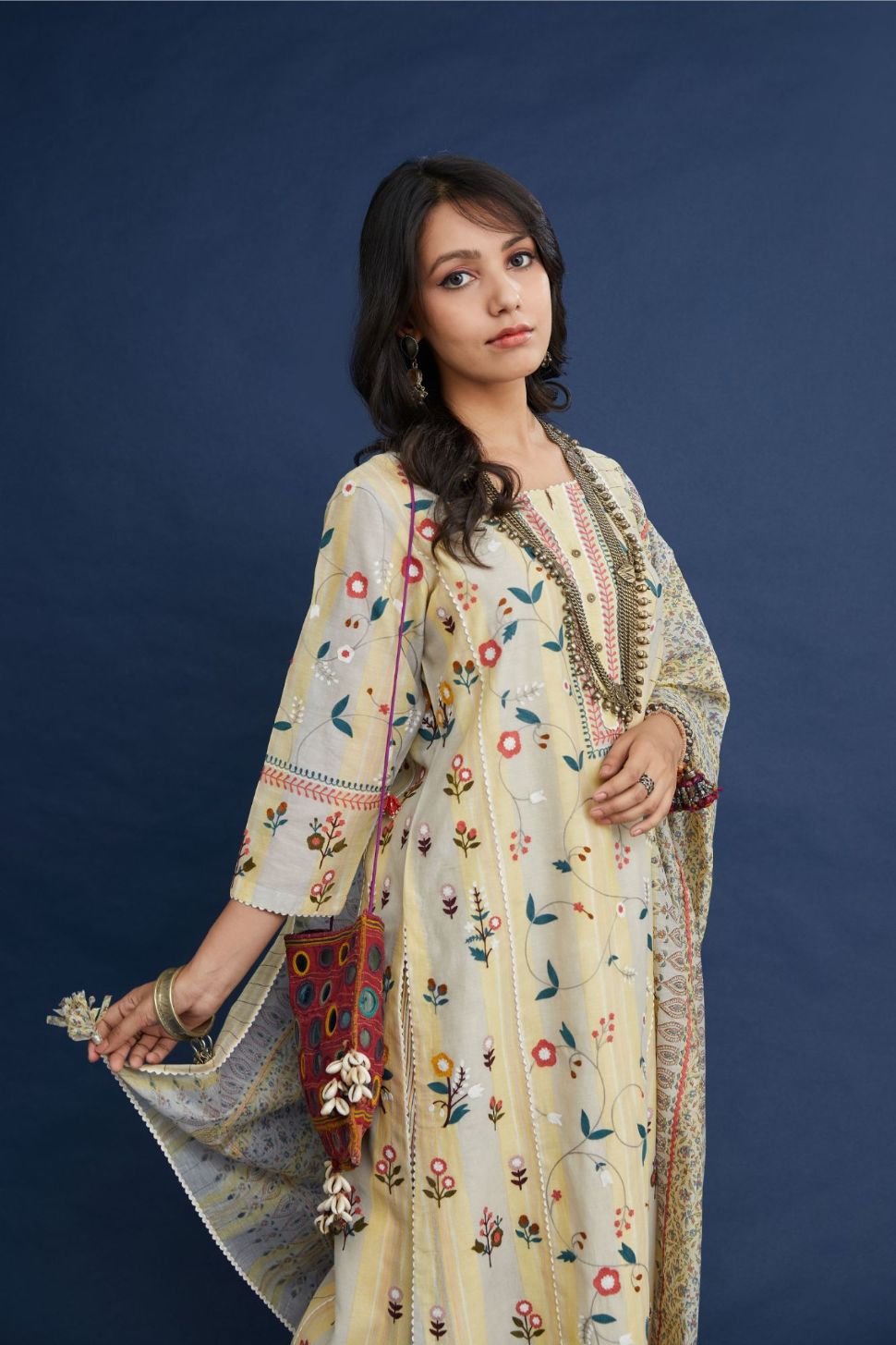Hand block printed silk chanderi kurta set with all-over multi thread jaal embroidery.