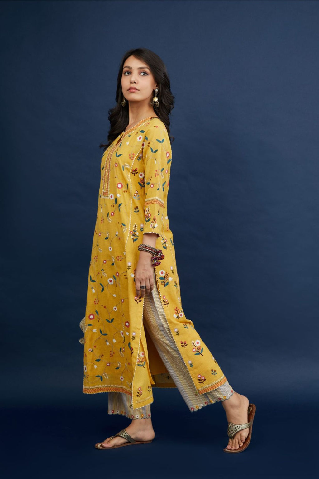 Corn yellow handspun  hand-woven cotton kurta set with all-over multi thread jaal embroidery .