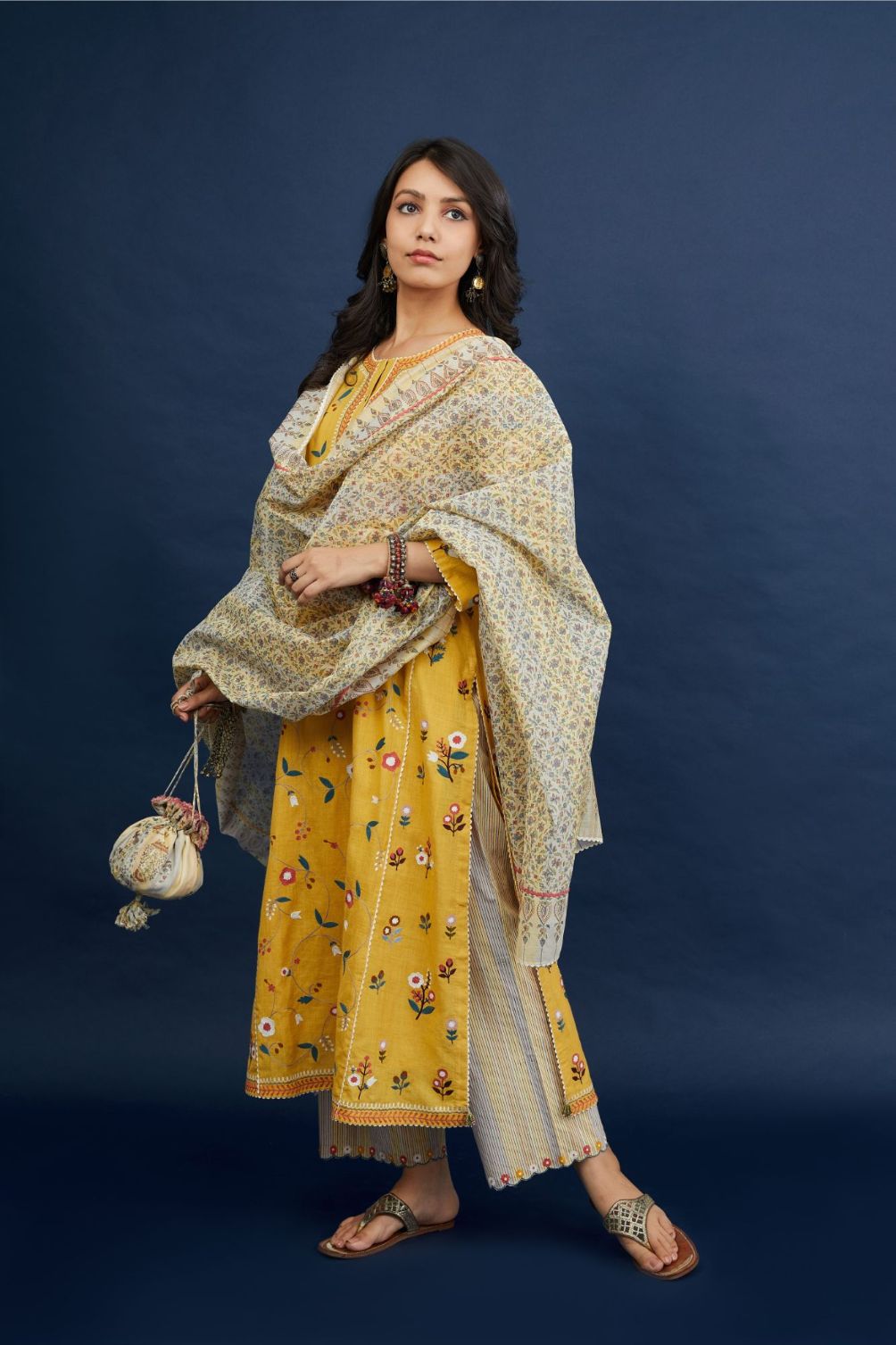 Corn yellow handspun  hand-woven cotton kurta set with all-over multi thread jaal embroidery .