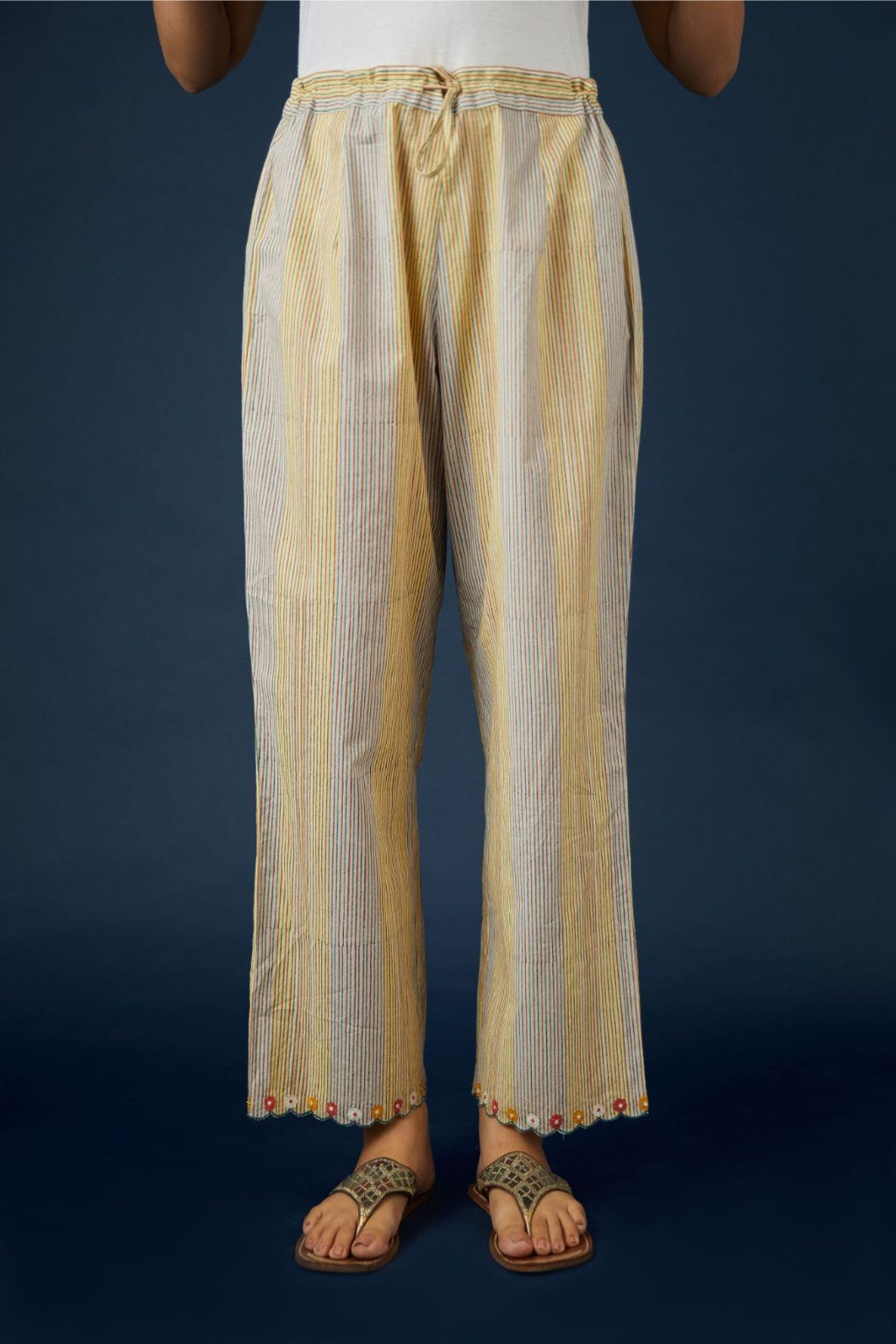 Hand block printed cotton pants with multi colored flower embroidery at bottom hem (Pants)