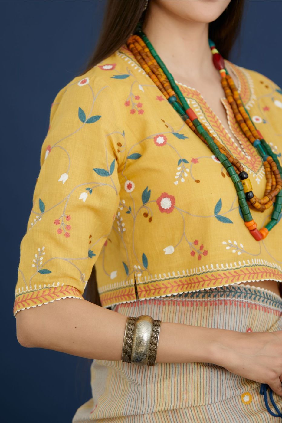 Corn yellow tank top blouse with all-over multi colored thread embroidery highlighted with ric-rac.(Blouse)