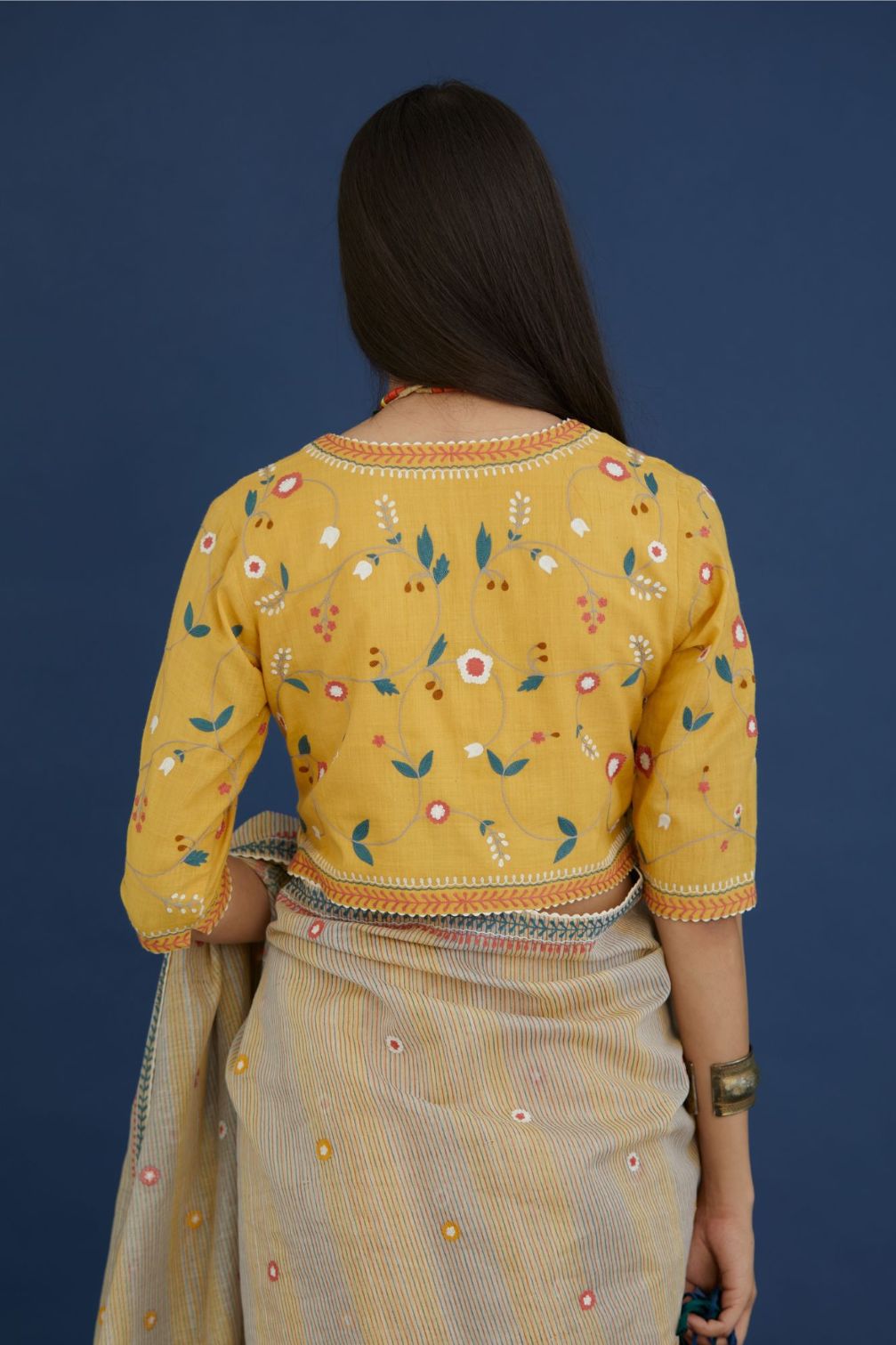 Corn yellow tank top blouse with all-over multi colored thread embroidery highlighted with ric-rac.(Blouse)
