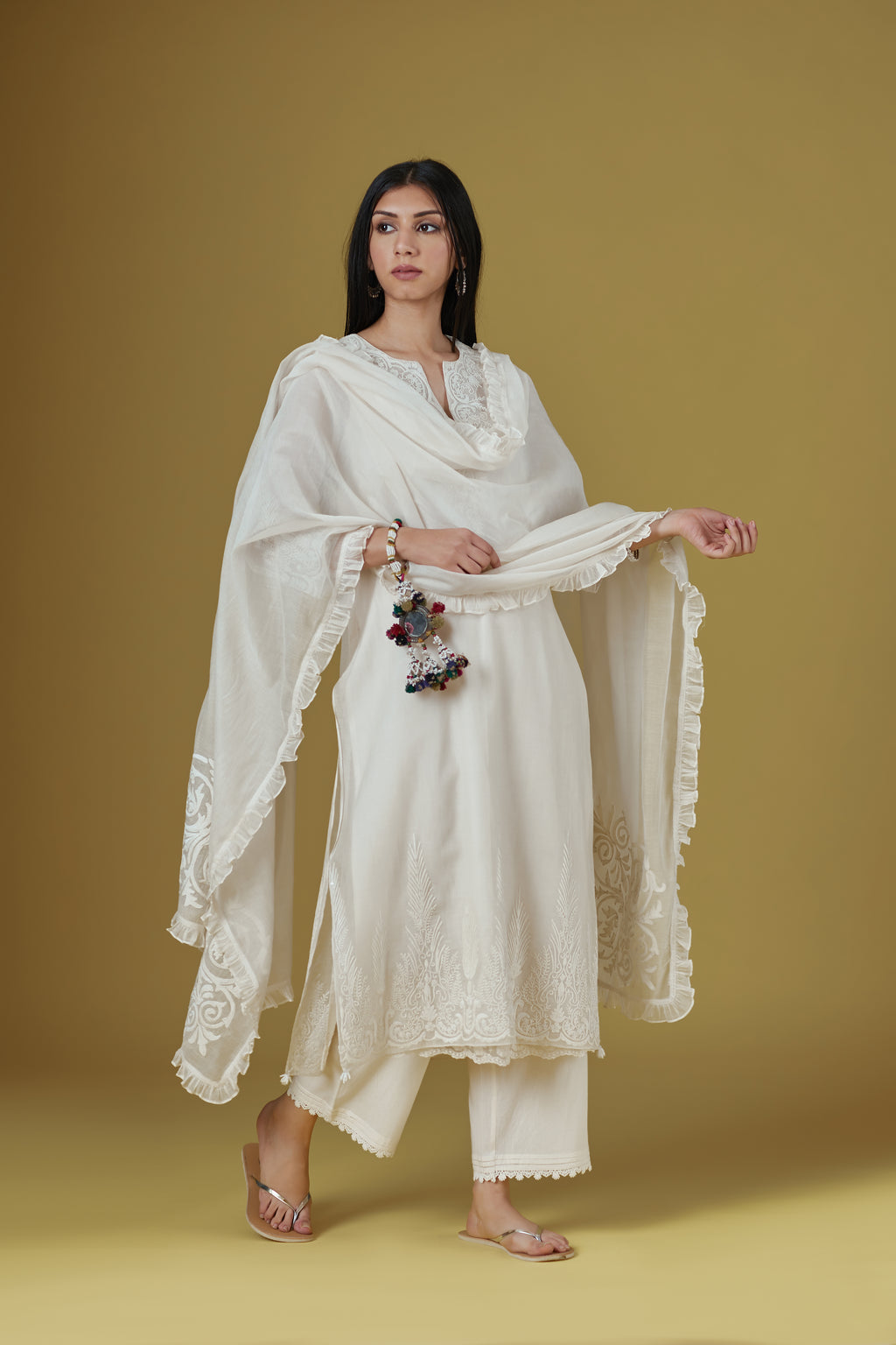 Dori embroidered straight kurta set with round neck and side slits