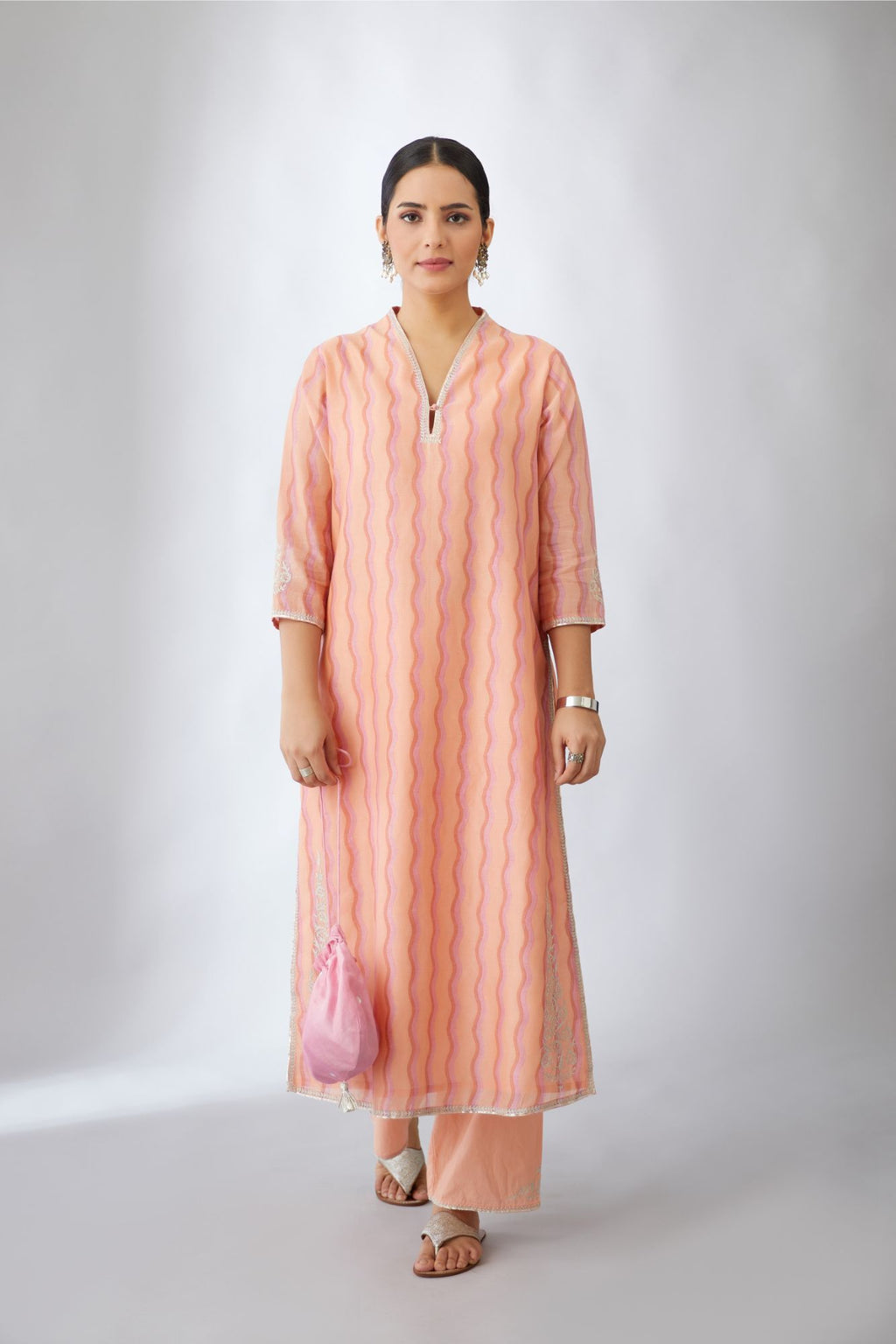 Silk Chanderi straight kurta set with all-over hand block print and silver zari embroidery.