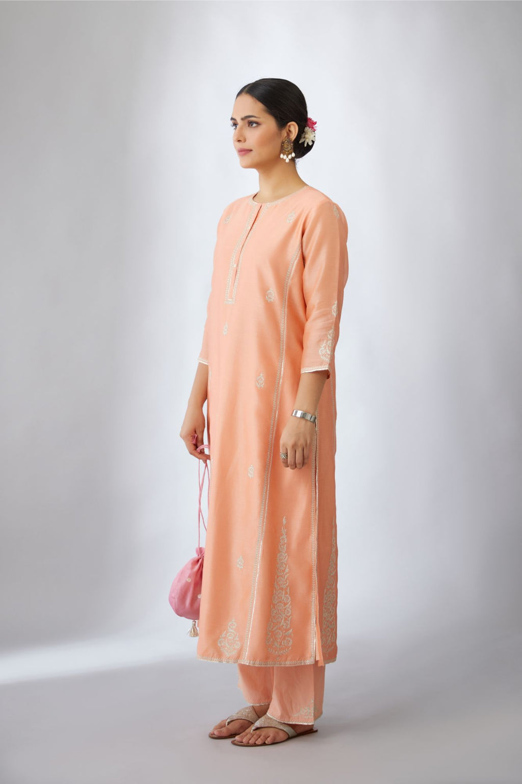 Peach silk chanderi kurta set with all-over silver zari & gota embroidery.