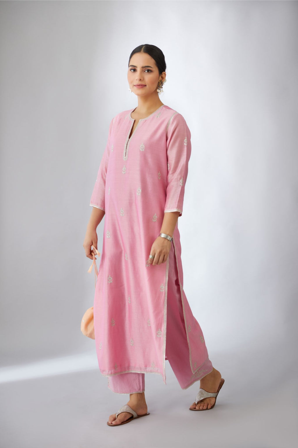 Pink silk chanderi kurta set with all-over silver zari embroidery.