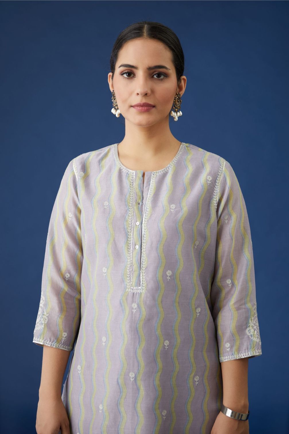 Purple and green hand block printed silk chanderi short kurta with silver zari and gota embroidery.
