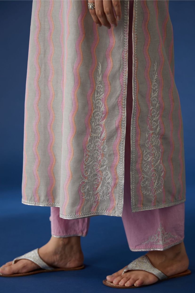 Pink and grey silk Chanderi straight kurta set with all-over hand block print and silver zari embroidery.