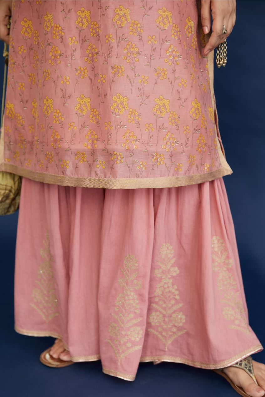 Dusty rose and yellow hand block printed short kurta set, highlighted with dull gold quilting.