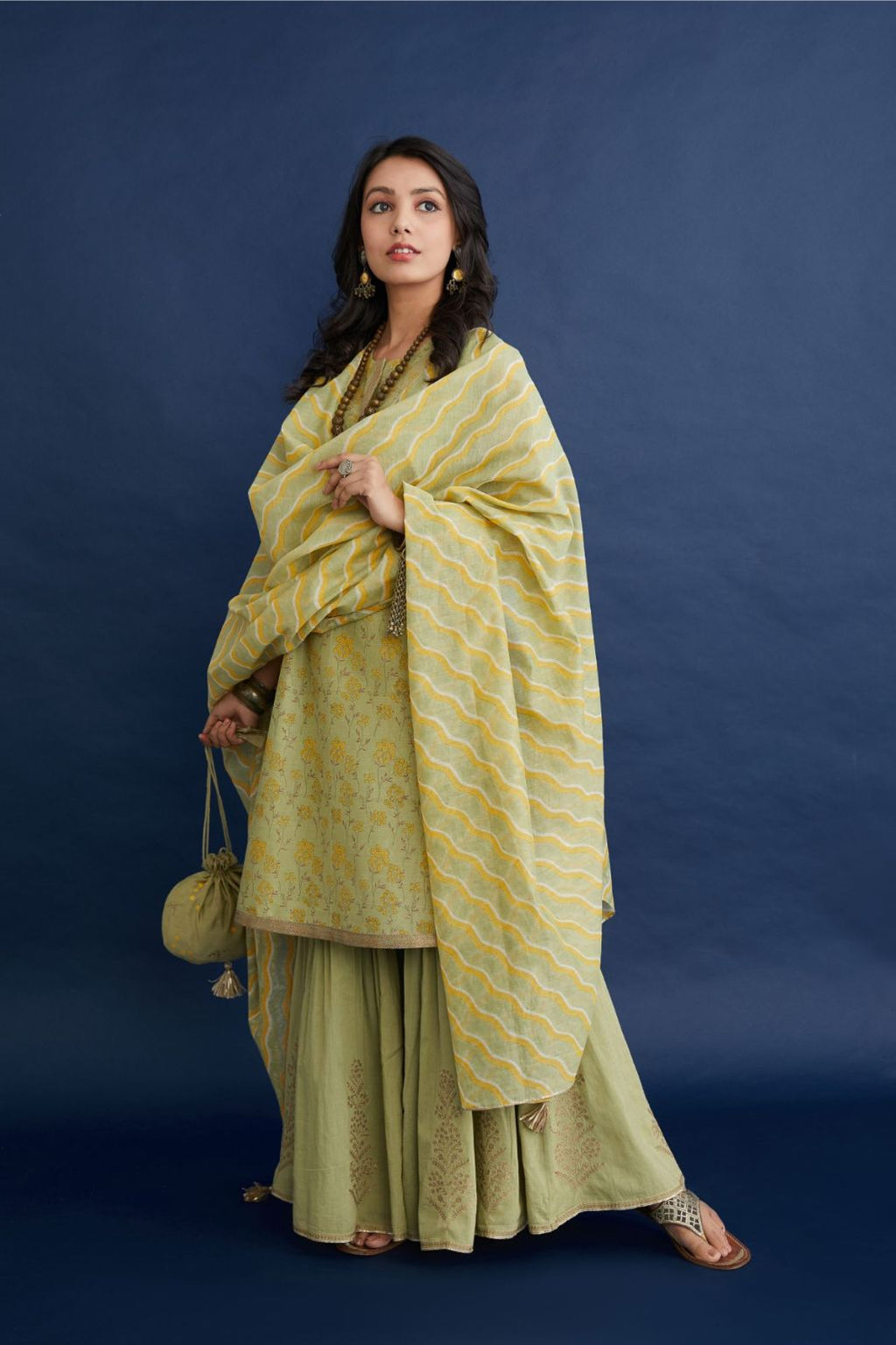 Green & yellow hand block printed short kurta set, highlighted with dull gold quilting.