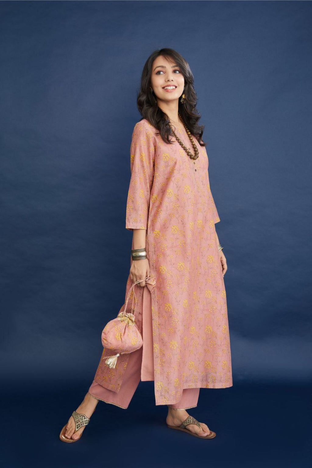 Dusty rose & yellow hand block printed straight kurta set, highlighted with dull gold quilting.