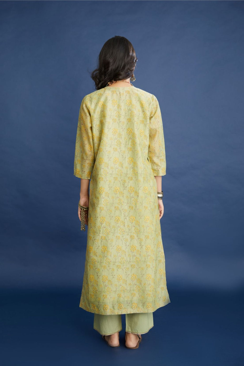 Green & yellow hand block printed straight kurta set, highlighted with dull gold quilting.