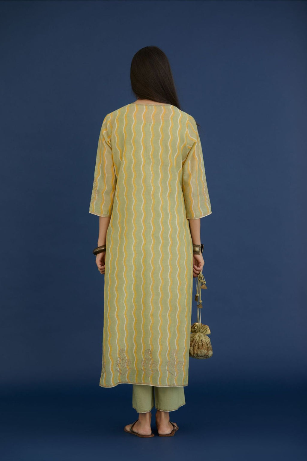 Green & yellow hand block printed straight kurta set, highlighted with dull gold zari embroidery.