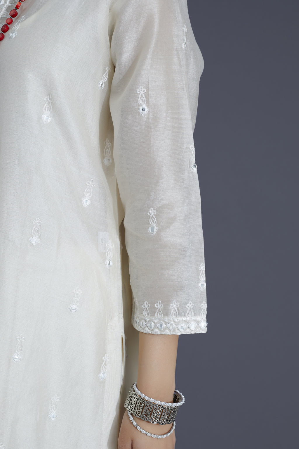 Off white silk chanderi straight kurta set with all-over small silk thread booti and mirror work embroidery (KURTA+SLIP+PANTS+DUPATTA)