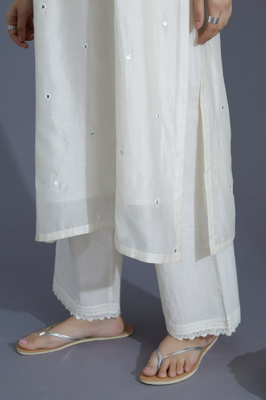 Off white silk chanderi straight kurta set with heavy embroidered neckline and all-over small mirror booti embroidery (KURTA+SLIP+PANTS+DUPATTA)