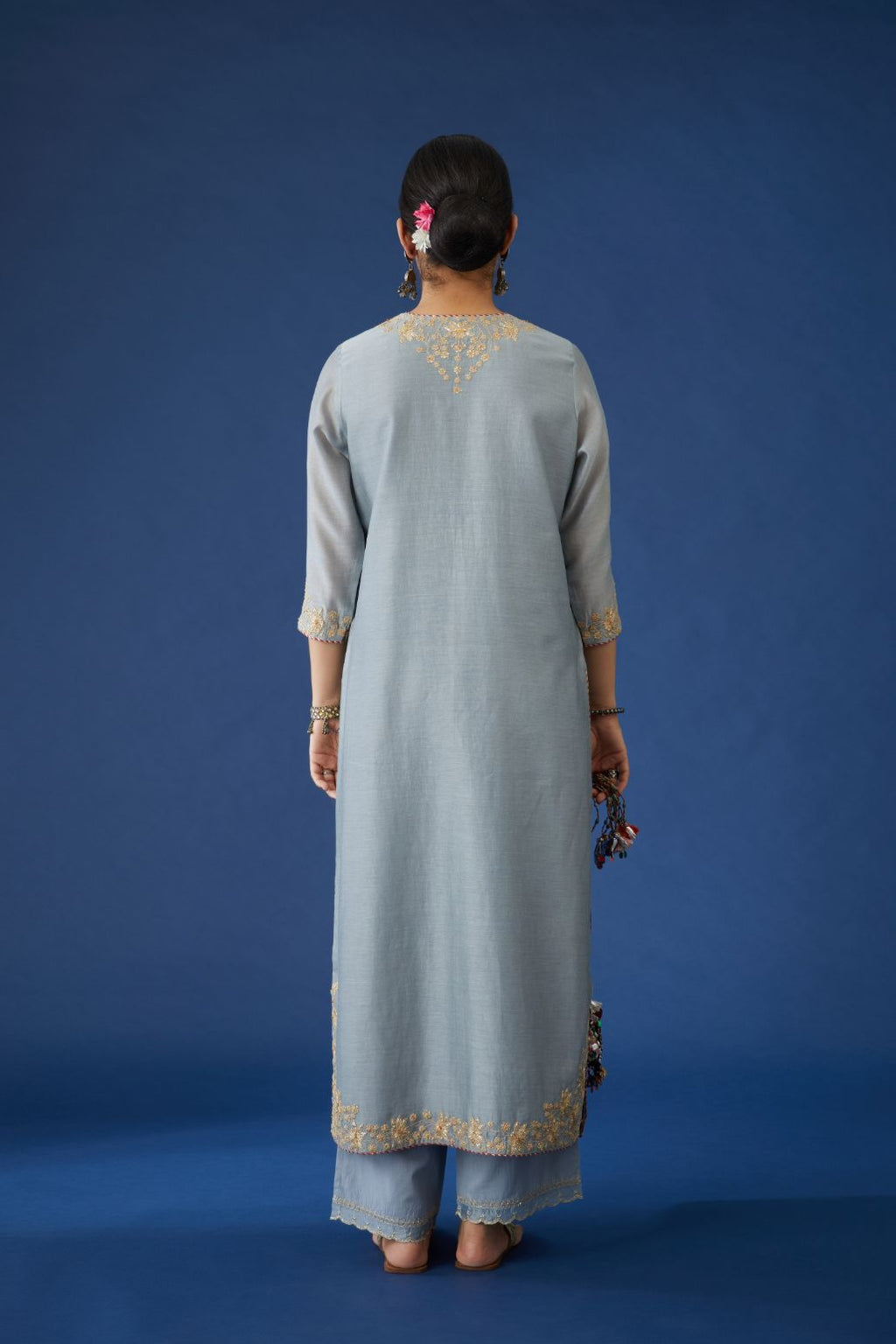Bluish grey silk chanderi straight kurta set with gota embroidery at neck and hem, highlighted with bead work.