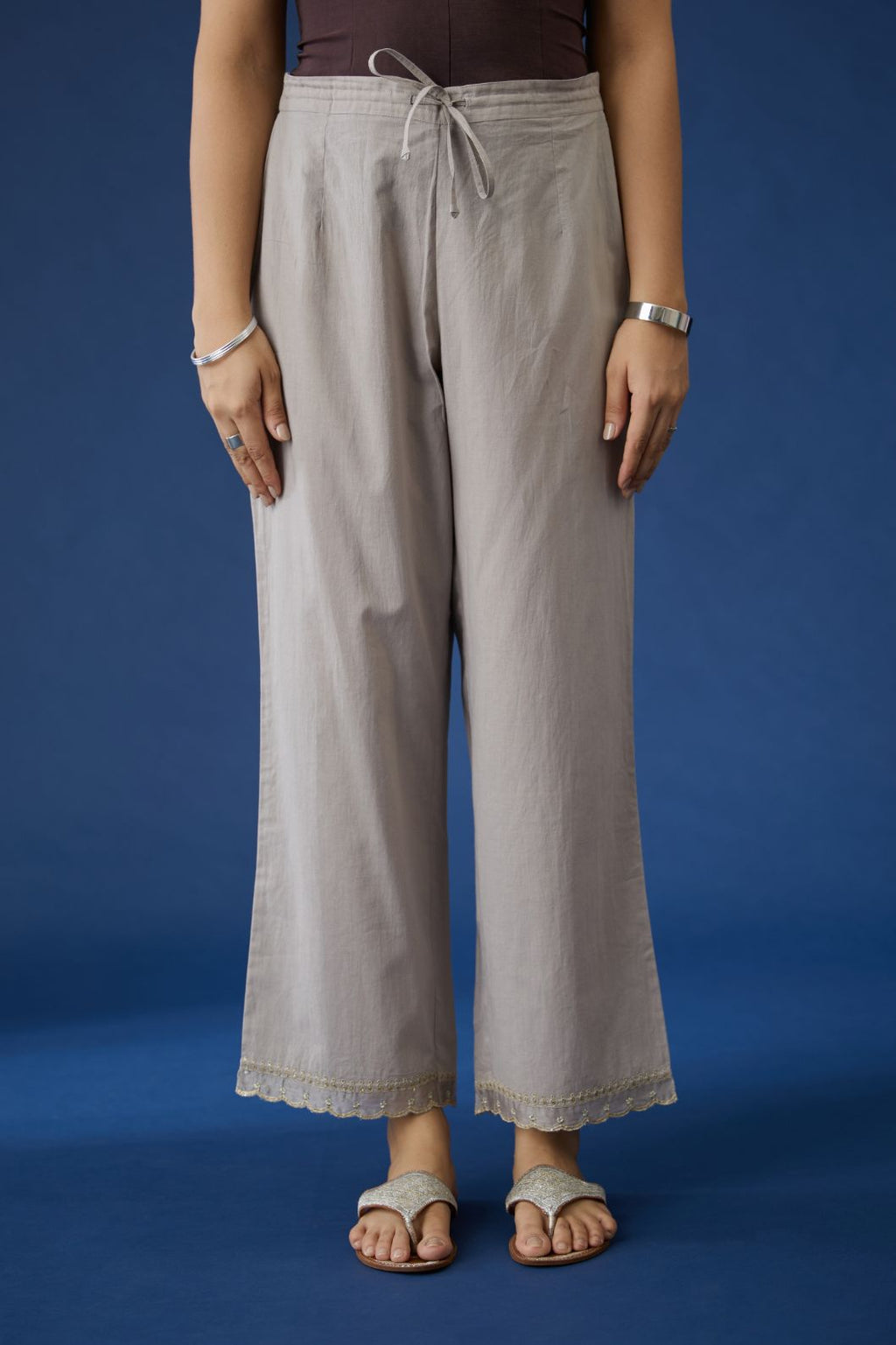 Warm grey cotton straight pants with gota and dori embroidery at bottom hem (Pants)