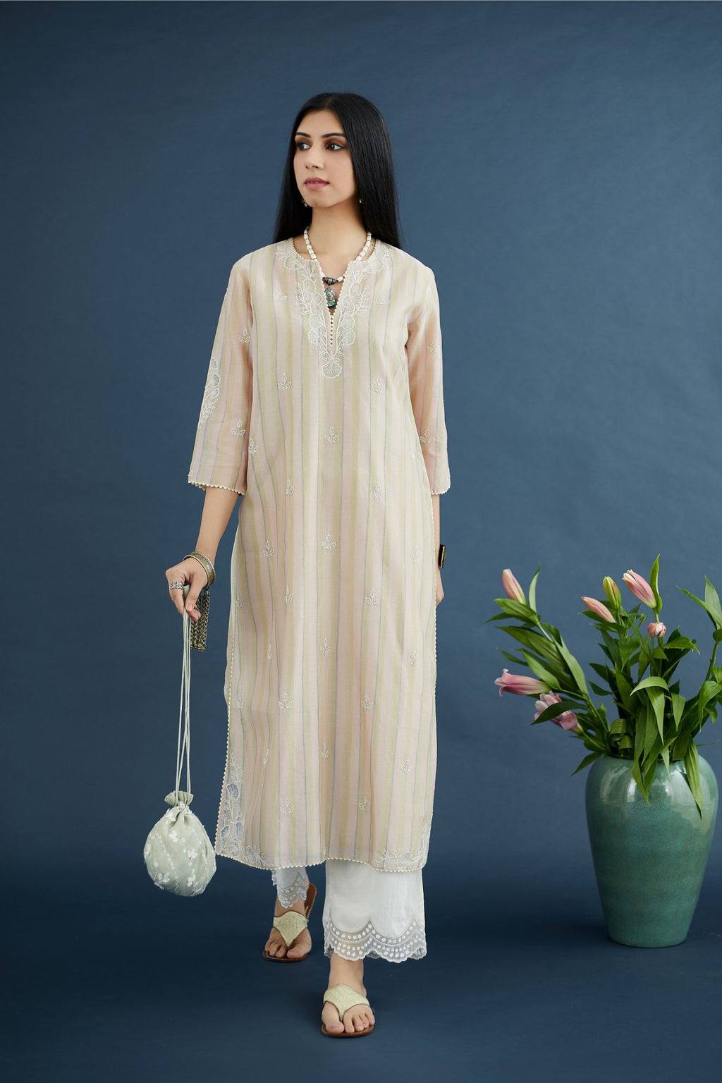 Multi striped hand block printed silk chanderi kurta set with cutwork flower embroidery and lace detailing at neck and side slits