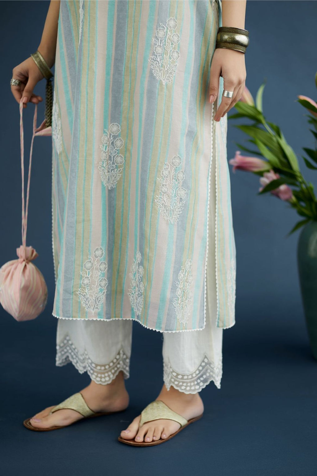 Multi striped hand block printed silk chanderi kurta set with all-over dori embroidered floral boota and lace detailing at neck and side slits