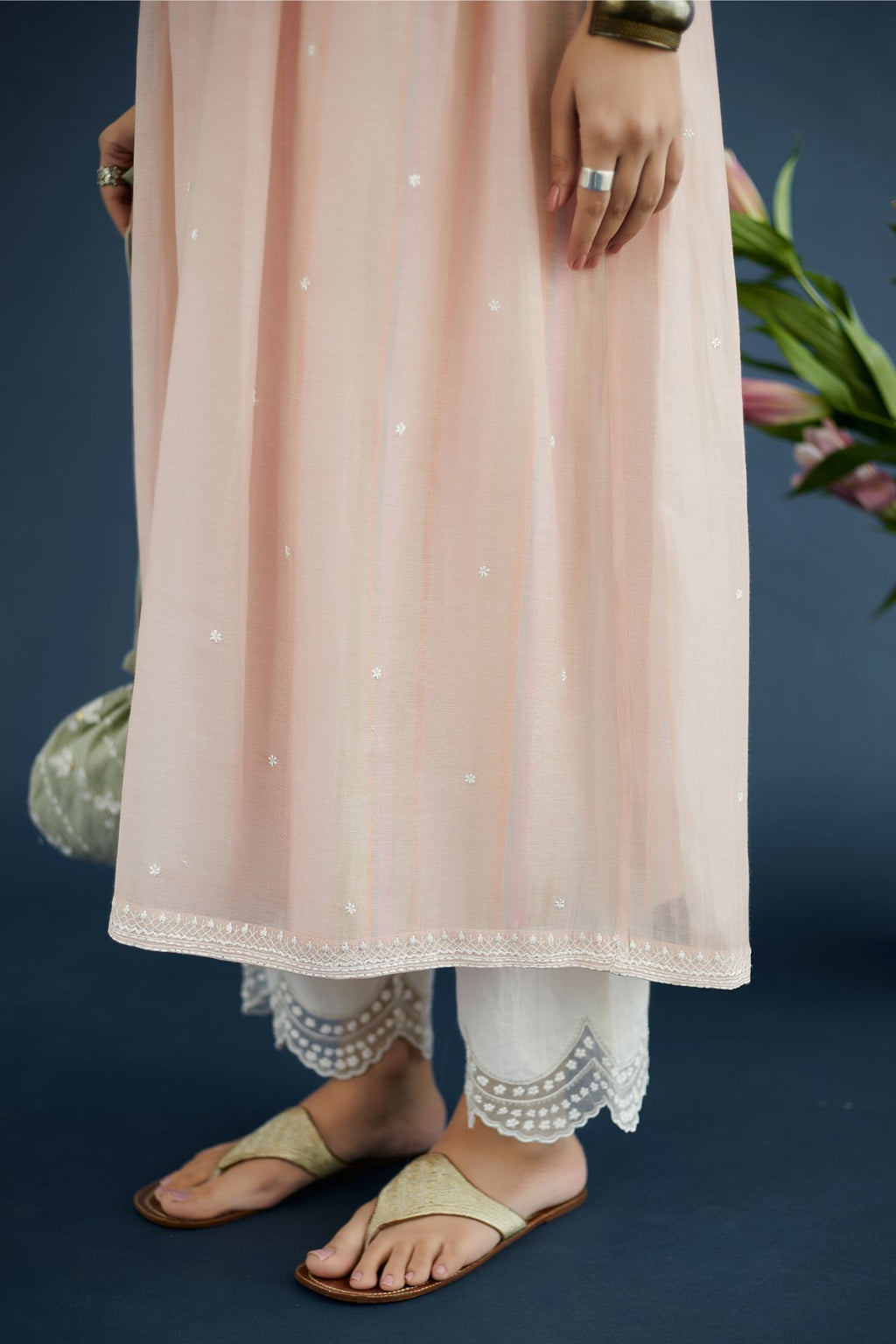 Pink embroidered kurta set with gathered empire waist line in front and back and hand block printed cotton slip inside