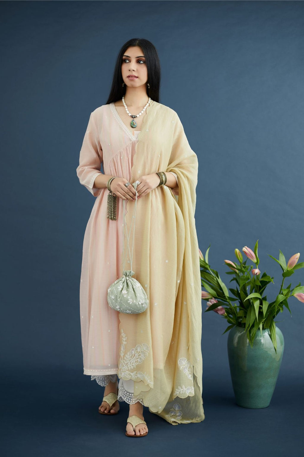 Pink embroidered kurta set with gathered empire waist line in front and back and hand block printed cotton slip inside