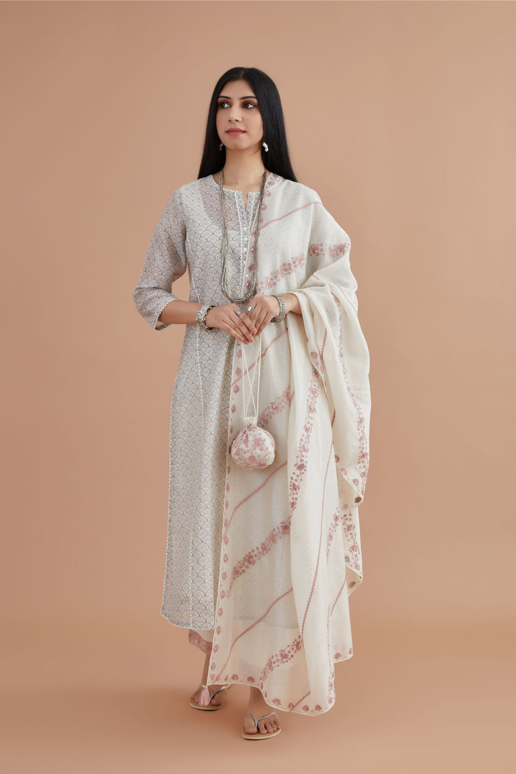 Off white silk Chanderi dupatta with all-over pink embroidery and rickrack, highlighted with sequin work.