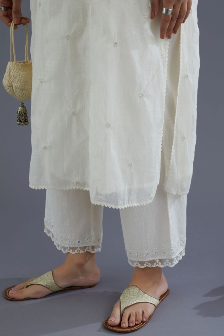 Off white cotton chanderi kurta set with knotted embroidery and embellished with sequins hand work