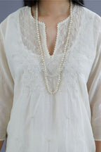 Off white cotton chanderi kurta set with knotted embroidery and embellished with sequins hand work