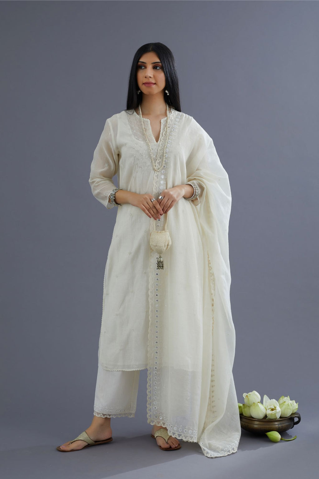 Off white cotton chanderi kurta set with knotted embroidery and embellished with sequins hand work