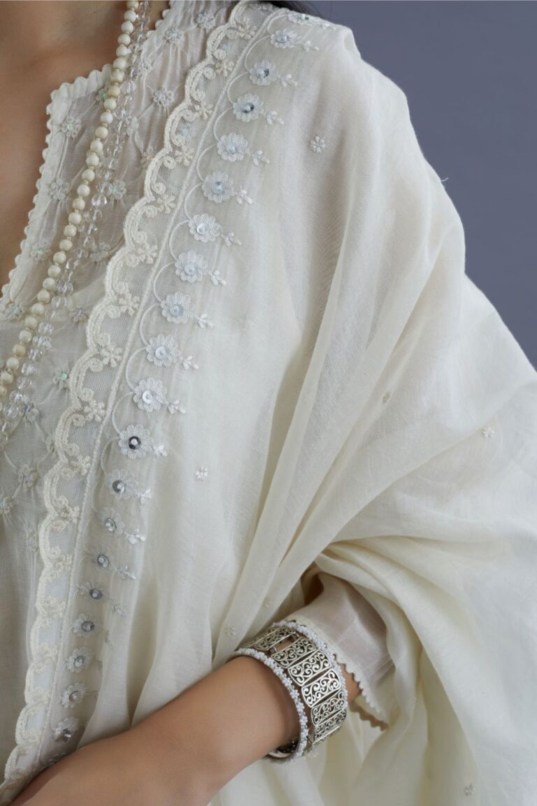 Off white cotton chanderi kurta set with knotted embroidery and embellished with sequins hand work