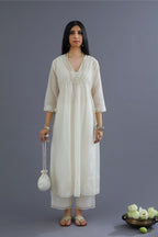 Off white cotton chanderi kurta set with gathered empire waist line in front and back and cotton slip