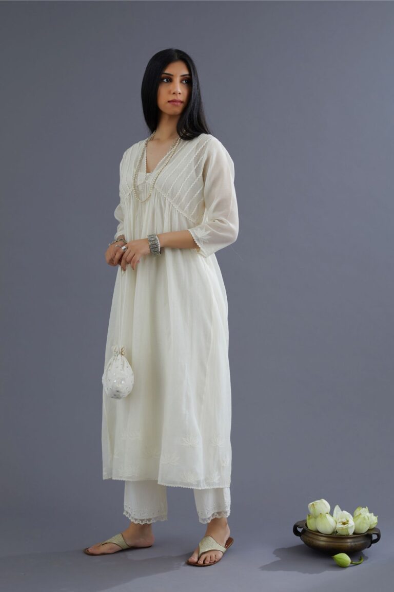 Off white cotton chanderi kurta set with gathered empire waist line in front and back and cotton slip