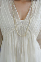 Off white cotton chanderi kurta set with gathered empire waist line in front and back and cotton slip