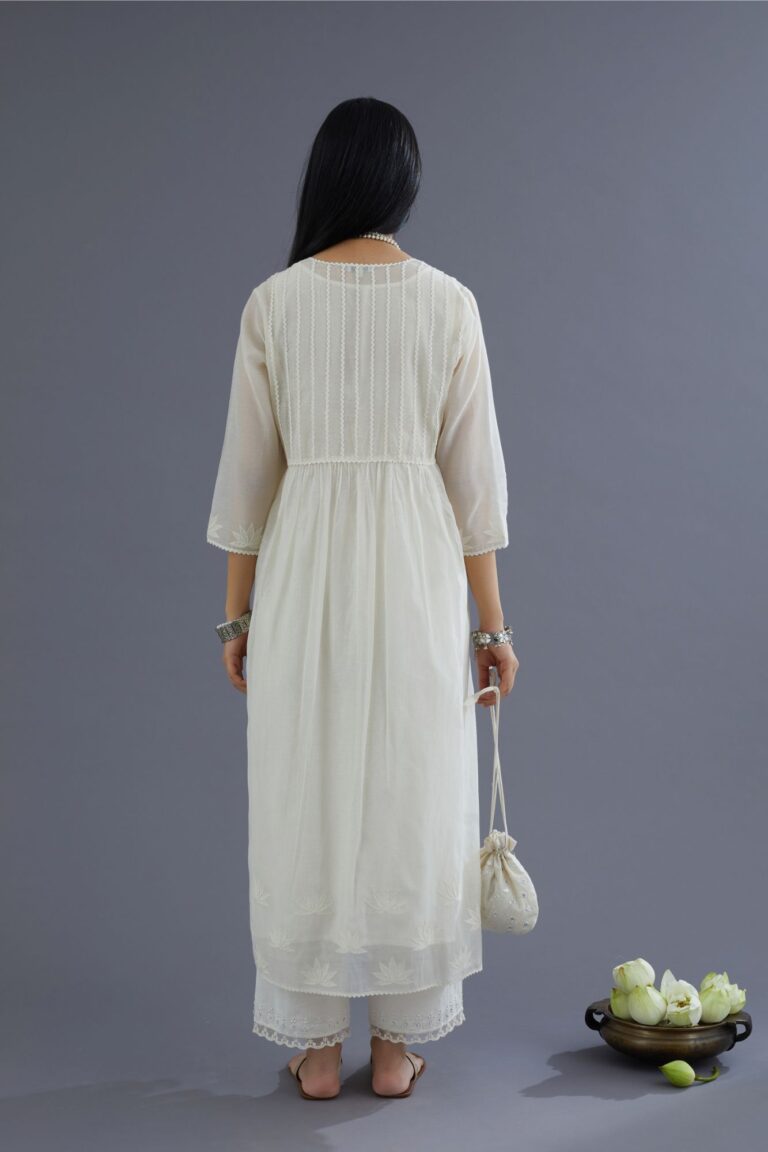 Off white cotton chanderi kurta set with gathered empire waist line in front and back and cotton slip