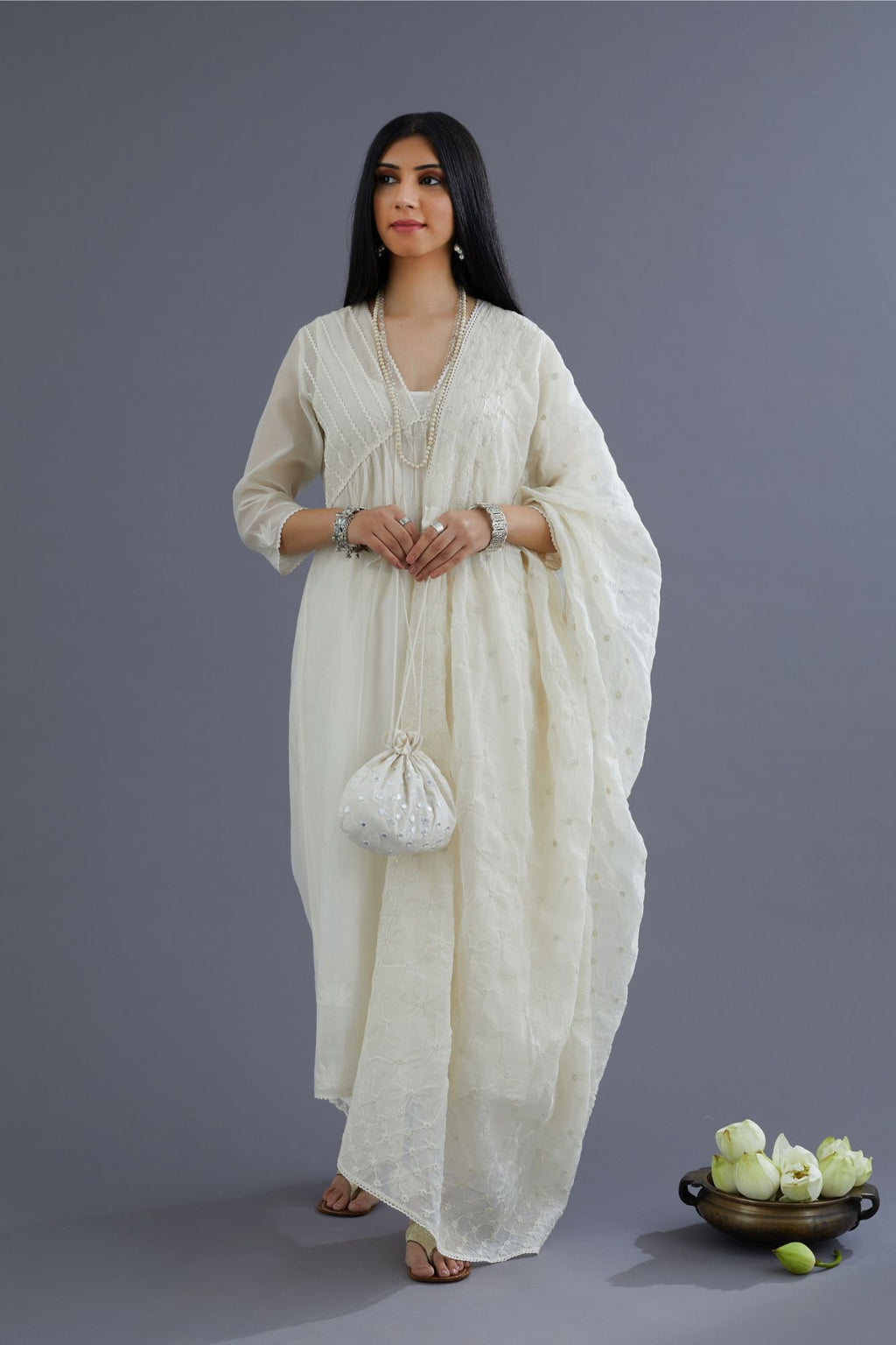 Off white cotton chanderi kurta set with gathered empire waist line in front and back and cotton slip