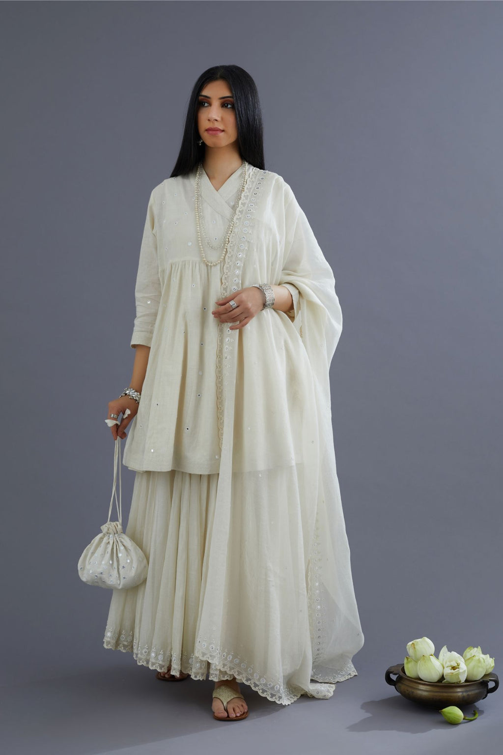 Off white Handspun Hand-Woven cotton short angrakha kurta set with  embroidered over-lapped neckline and mirror hand work