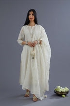 Cotton Chanderi dupatta with all over knotted thread embroidery and fabric tassels at all corners.