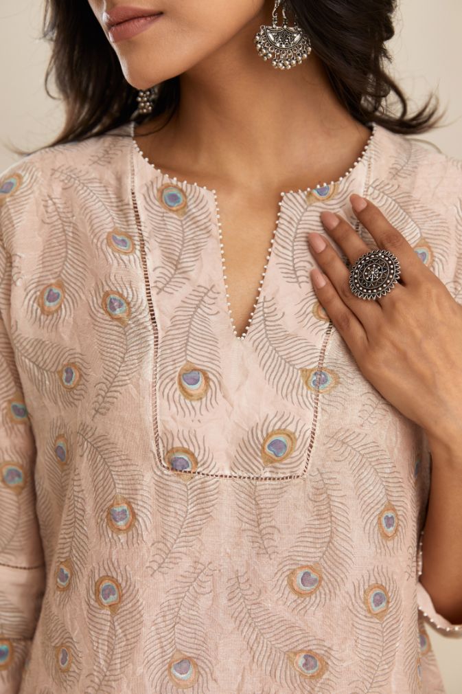 Pink hand block printed straight kurta set with silk yoke detailing in front.