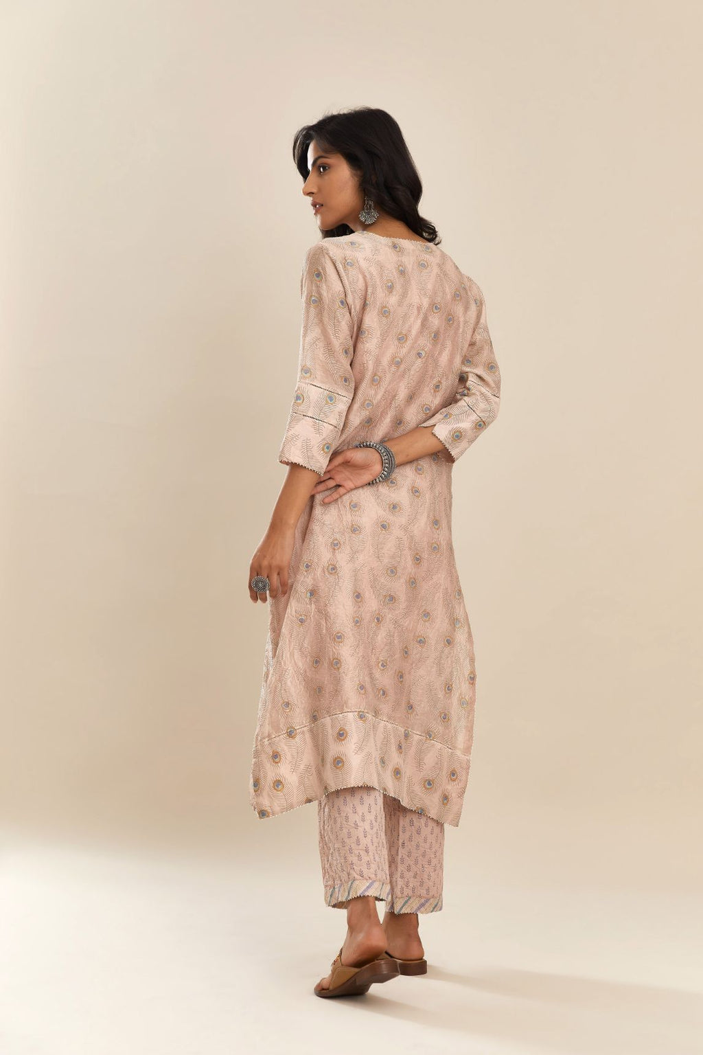 Pink hand block printed straight kurta set with silk yoke detailing in front.